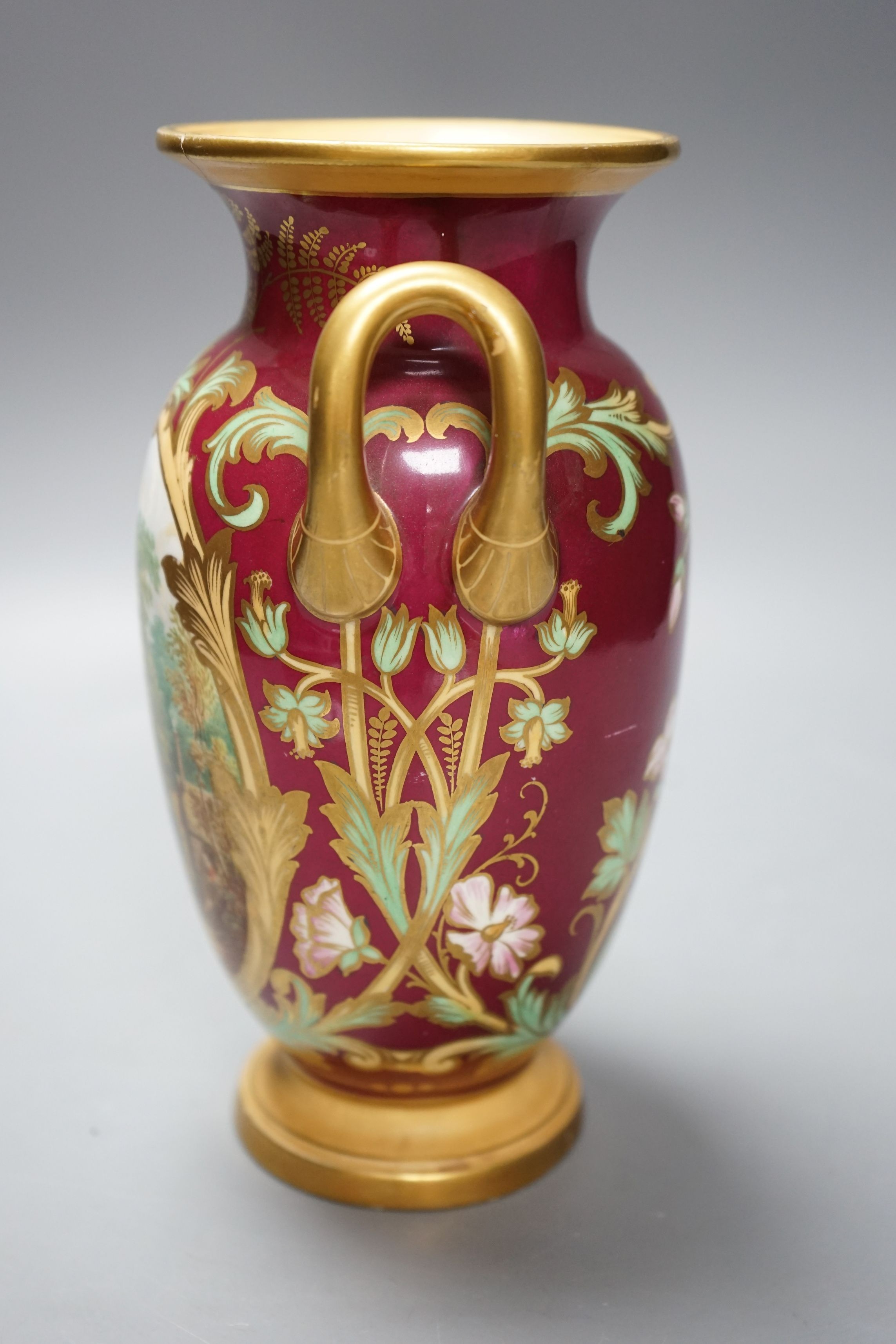 A 19th century English bone china two handled vase, decorated with a central cartouche, in distinctly signed on base, 21.5cms high